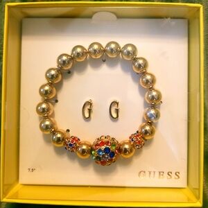 GUESS Golden and Multicolor Beaded Bracelet and Earring Set. Item J738-25.